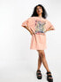 ASOS DESIGN oversized t-shirt with festival graphic in pink