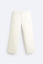 Trousers with carpenter pocket