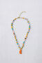 BEADED NECKLACE WITH FRUIT PENDANT