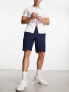 Фото #1 товара Hollister 9in flat front twill chino shorts in navy