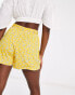 ASOS DESIGN tie belt flippy short in mustard ditsy floral