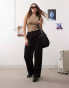 Фото #1 товара Weekday Drew mid waist slouchy trousers with front pleats in black