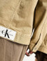 Фото #6 товара Calvin Klein Jeans Unisex extreme oversized denim jacket in beige - exclusive to ASOS