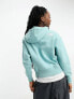 The North Face Essential oversized hoodie in blue Exclusive at ASOS