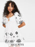 ASOS DESIGN Petite puff sleeve mini dress with black embroidery in white