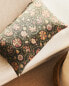 Cushion cover with floral embroidery