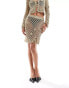 ASOS DESIGN knitted mini skirt in metallic yarn with crochet floral embellishment co-ord