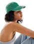 ASOS DESIGN washed slogan cap in green