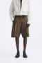 Wide-leg pleated bermuda shorts