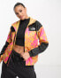 The North Face Sheru hooded shell jacket in yellow flower print Exclusive at ASOS