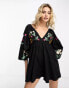 ASOS DESIGN smock playsuit with embroidered sleeves in black