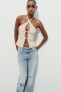 Fitted halter top with buckles