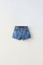 Ripped denim bermuda shorts