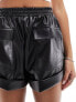 ASOS DESIGN leather look turn up utility shorts in black