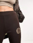 Nicce able flared leggings in brown with split hem