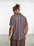 ASOS DESIGN relaxed polo shirt in navy & brown stripe