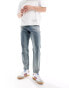 ASOS DESIGN tapered fit jeans with vintage tint in mid wash blue - MBLUE