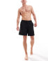 Фото #1 товара Weekday Ed skater style swim shorts in black