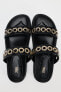 Flat slider sandals with appliqués