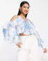 Фото #4 товара ASOS DESIGN ruffle blouse with lace up back in blue floral