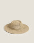 Wide-brimmed straw beach hat