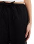 Monki drawstring straight leg trousers in black