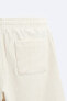 Irregular jacquard bermuda shorts