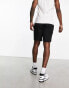 Фото #2 товара Hollister 7inch flat front chino shorts in black