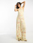 Reclaimed Vintage sleeveless jumpsuit in creamy floral