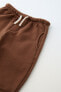 Фото #12 товара Комплект из толстовки и брюк из мягкой ткани ZARA
