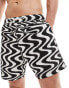 ASOS DESIGN swim shorts in mid length in black wave print