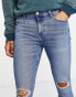 Фото #3 товара ASOS DESIGN spray on jeans with power stretch in mid wash blue with knee rips