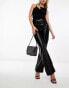 Фото #1 товара Abercrombie & Fitch 90s relaxed straight fit faux leather trousers in black