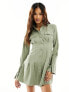 Фото #1 товара ASOS DESIGN mini shirt dress with oversized cuff detail in khaki pinstripe