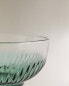 Glass bowl with raised design