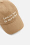 CAP WITH EMBROIDERED SLOGAN