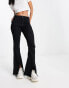 Фото #8 товара Hollister high rise slit flare jeans in black