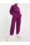 Фото #3 товара Брюки спортивные женские Nike Therma-FIT Cozy Core фиолетовые