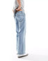 ASOS DESIGN wide flared jeans in mid wash blue