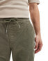 Фото #2 товара ASOS DESIGN tapered fit corduroy trouser with elasticated waist in khaki