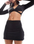 Kaiia super stretch skort with split in black