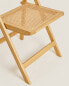 Rattan and wood folding chair