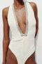 Fitted bodysuit with rhinestones