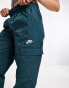 Фото #2 товара Nike Sport Utility woven cargo trousers in deep jungle navy