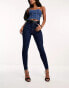 ASOS DESIGN – Ultimate – Eng geschnittene Jeans in Dunkelblau Синий, W24 L34 - фото #1