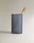 Coloured toothbrush holder