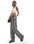 Фото #10 товара ONLY Tall wide leg trouser in black and white stripe