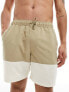 ASOS DESIGN swim shorts in mid length in khaki block print