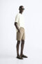 Textured mesh bermuda shorts