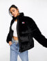 Tommy Jeans faux fur puffer jacket in black